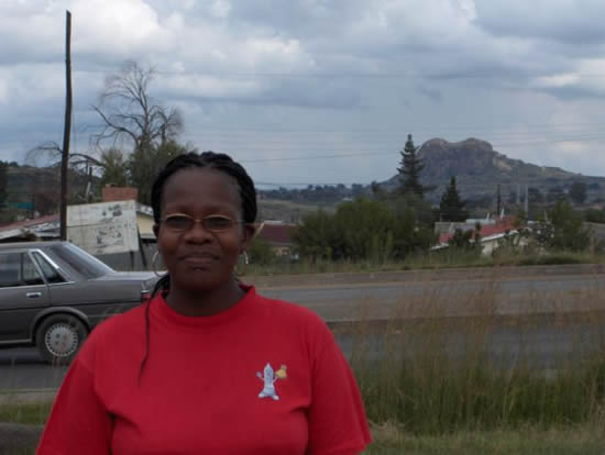 Lesotho, Boleloa Falten, with road and hill in bckground - THOMAS Mar08 041