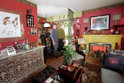 My Digs by Carla Gillis - Featuring the home of Bradford McIntyre (right )& Deni Daviau (Left); sixth-floor one-bedroom apartment with cozy deck. Photo by Doug Shanks - WestEnder - www.westender.com -  June 2, 2005.