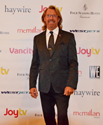 Photo: Bradford McIntyre, at AIDS Vancouver`s Premiere Fundraiser, the 8th Annual Celebrity Dim Sum - October 4th 2015. Bradford McIntyre, (HIV+ 31 years & former AIDS Vancouver Vice Chair), manning the Silent Auction at Celebrity Dim Sum. Photo Credit: Eric Rudolph