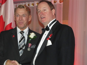 Bradford McIntyre receives the Queen Elizabeth II Diamond Jubilee Medal on November 27, 2012.