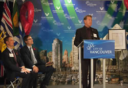 AIDS Vancouver Director Bradford McIntyre, Living with HIV, presents the We Care RED RIBBON Campaign Public Service Announcement, Stigma: The Silent Epidemic. Breaking the Silence, to Vancouver Mayor Gregor Robertson and Vancouver City Council, at City Hall, in the City of Vancouver, BC., Canada.