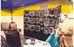 AIDS Walk 96 Exhibit - Bradford McIntye manning the Look Beyond Exhibit, a selection of photographs of people across Canada living with HIV and AIDS, photographed by Michelle Valberg, for her book LOOK BEYOND The Faces & Stories of People with HIV/AIDS. Vancouver,BC, Canada.