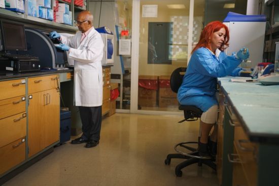 FIU Herbert Wertheim College of Medicine researchers Nair (left) and Yndart (right) in the lab.