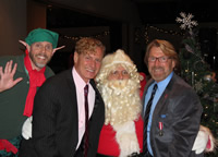 Photo: Bradford McIntyre (Right) & husband Deni Daviau (Left), sitting on Santa's lap at Positive Living BC Members' Holiday Season Dinner. December 3, 2015