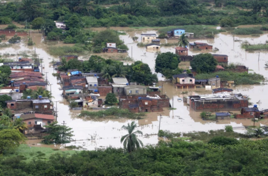 A flood area with houses and trees