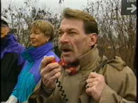 Guest Speaker, World AIDS Day, Parliament Hill, Bradford McIntyre gives World AIDS Day address to the crowd on Parliament Hill, Major Hills Park, in Ottawa. Bradford voices to the crowd, WE ARE ALL CONNECTED, and following he leads Hands across the Bridge from the Ottawa, Ontario side of the Royal Alexandra Interprovincial Bridge to the Hull, Quebec side.